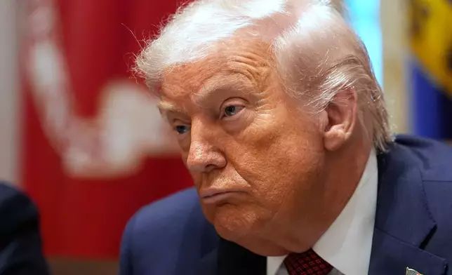 President Donald Trump listens during a roundtable on farm subsidies in the Cabinet Room of the White House, Monday, Dec. 8, 2025, in Washington. (AP Photo/Alex Brandon)