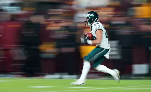 Philadelphia Eagles running back Will Shipley runs against the Washington Commanders during the first half of an NFL football game, Saturday, Dec. 20, 2025, in Landover, Md. (AP Photo/Stephanie Scarbrough)