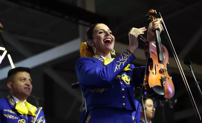 The Los Angeles Rams Mariachi Band performs before an NFL football game against the Tampa Bay Buccaneers, Sunday, Nov. 23, 2025, in Inglewood, Calif. (AP Photo/Jessie Alcheh)