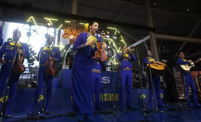 The Los Angeles Rams Mariachi Band performs before an NFL football game against the Tampa Bay Buccaneers, Sunday, Nov. 23, 2025, in Inglewood, Calif. (AP Photo/Jessie Alcheh)