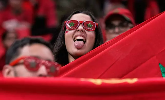 Morocco fans wait for the start of the Africa Cup of Nations group A soccer match between Zambia and Morocco in Rabat, Morocco, Monday, Dec. 29, 2025. (AP Photo/Themba Hadebe)