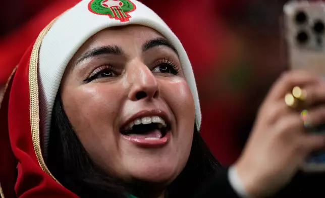 A Moroccan fan waits for the start of the Africa Cup of Nations group A soccer match between Zambia and Morocco in Rabat, Morocco, Monday, Dec. 29, 2025. (AP Photo/Themba Hadebe)
