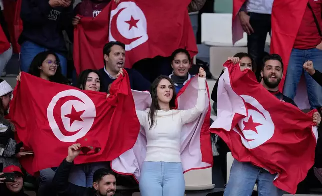 Tunisia's supporters wait for the start of the Africa Cup of Nations group C soccer match between Tanzania and Tunisia in Rabat, Morocco, Tuesday, Dec. 30, 2025. (AP Photo/Mosa'ab Elshamy)