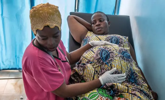 Ernestine Baleke receives pre-natal care that used to be free at the Rehema Health Center in Goma, Democratic Republic of Congo, Nov. 14, 2025. (AP Photo/Moses Sawasawa)