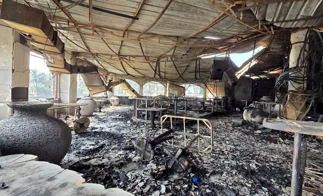 The charred interiors of a nightclub, which caught fire early Sunday, are seen in Arpora, Goa, India, Sunday, Dec. 7, 2025. (AP Photo)