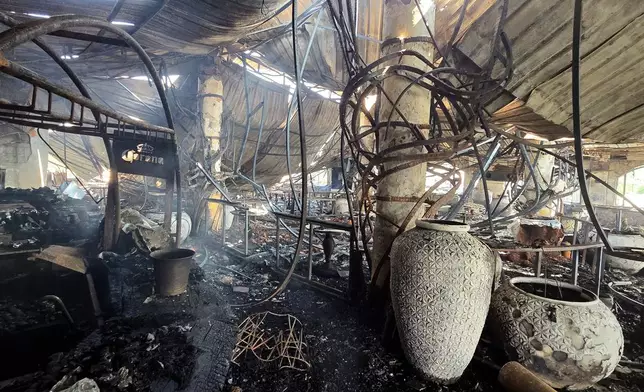 The charred interior of a nightclub, which caught fire early Sunday, is seen in Arpora, in Goa, India, Sunday, Dec. 7, 2025. (AP Photo)