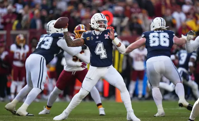 Dallas Cowboys quarterback Dak Prescott throws during the first half an NFL football game against the Washington Commanders Thursday, Dec. 25, 2025, in Landover, Md. (AP Photo/Stephanie Scarbrough)