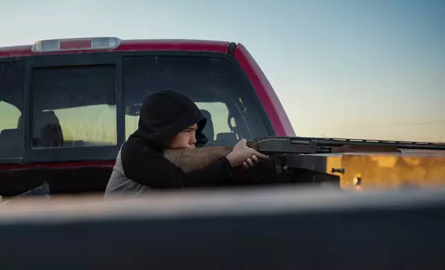 James Schaeffer, 7, hunts in Kotzebue, Alaska, Friday, Sept. 26, 2025. (AP Photo/Annika Hammerschlag)
