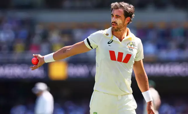 Australia's Mitchell Starc ready to bowl during the second Ashes cricket test match between Australia and England in Brisbane, Thursday, Dec. 4, 2025.. (AP Photo/Tertius Pickard)