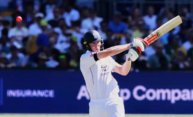 England's Zak Crawley plays a shot during the second Ashes cricket test match between Australia and England in Brisbane, Thursday, Dec. 4, 2025.. (AP Photo/Tertius Pickard)