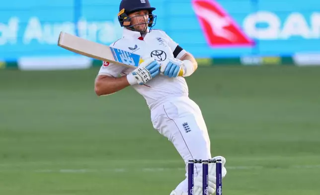 England's Joe Root plays a shot during the second Ashes cricket test match between Australia and England in Brisbane, Thursday, Dec. 4, 2025.. (AP Photo/Tertius Pickard)