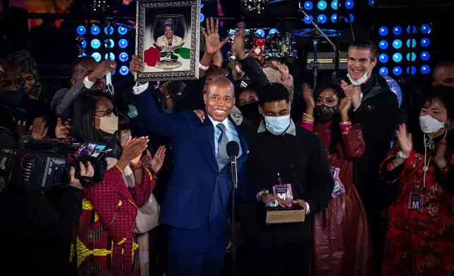 FILE - Eric Adams is sworn in as mayor of New York City on the stage of the New Year's Eve celebration in New York's Times Square on Saturday, Jan. 1, 2022. (AP Photo/Robert Bumsted, File)