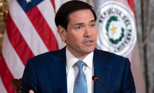 Secretary of State Marco Rubio, accompanied by Paraguay's Foreign Minister Rubén Ramírez Lezcano, speaks during the signing ceremony of the United States-Paraguay Status of Forces Agreement at the State Department in Washington, Monday, Dec. 15, 2025. (AP Photo/Jose Luis Magana)