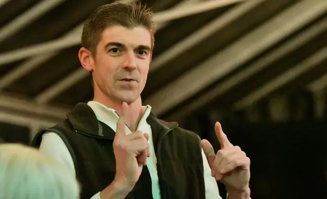 Ryan Crosswell, former federal prosecutor who quit the Department of Justice in protest, speaks at a campaign event for his run for Congress, Dec. 4, 2025, in Allentown, Pa. (AP Photo/Marc Levy)