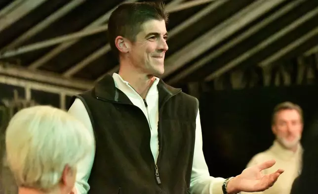 Ryan Crosswell, a former federal prosecutor who quit the Department of Justice in protest, speaks at a campaign event for his run for Congress, Dec. 4, 2025, in Allentown, Pa. (AP Photo/Marc Levy)