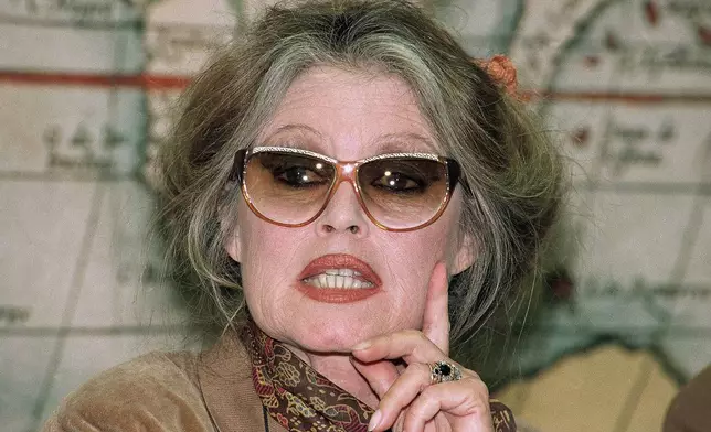 FILE - Former French film star Brigitte Bardot attends a press conference in Brussels, April 15, 1992, protesting against cruelty against animals in Europe, especially the cruelties practiced during festivities in Spain. (AP Photo/Carl Duyck, File)