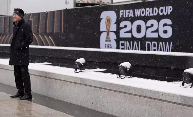 People arrive for the draw for the 2026 soccer World Cup at the Kennedy Center in Washington, Friday, Dec. 5, 2025. (AP Photo/Stephanie Scarbrough)