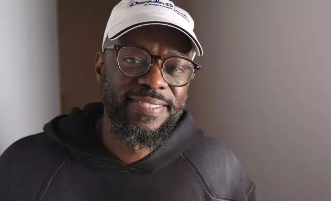 Willonius Hatcher, also known as King Willonius, poses for a portrait near his presentation at the a16z AI Creative Gallery, Thursday, Sept. 18, 2025, in New York. (AP Photo/Frank Franklin II)