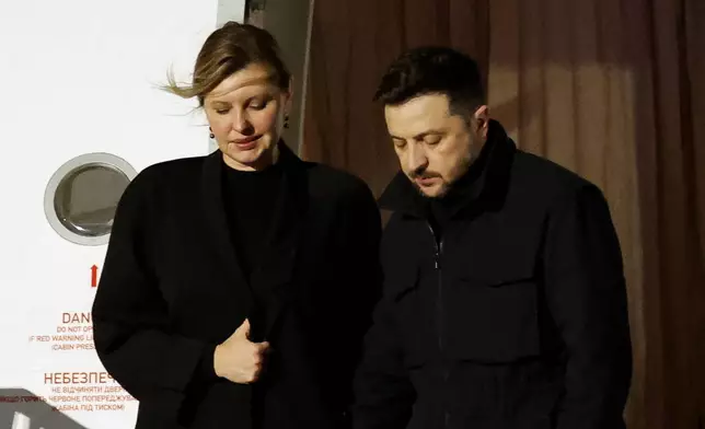 Ukrainian President Volodymyr Zelenskyy and first lady Olena Zelenska arrive at Dublin Airport for his visit to Ireland, Monday, Dec. 1, 2025. (Clodagh Kilcoyne/Pool Photo via AP)