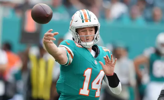Miami Dolphins quarterback Quinn Ewers throws a pass during the half of an NFL football game against the Cincinnati Bengals, Sunday, Dec. 21, 2025, in Miami Gardens, Fla. (AP Photo/Lynne Sladky)