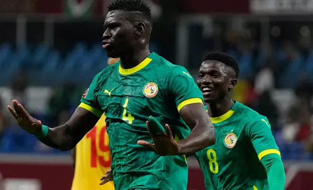 Senegal's Abdoulaye Seck celebrates his goal during the Africa Cup of Nations group D soccer match between Benin and Senegal in Tangier, Morocco, Tuesday, Dec. 30, 2025. (AP Photo/Themba Hadebe)