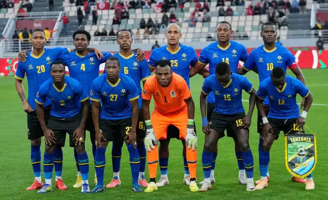 Tanzania's players pose before the Africa Cup of Nations group C soccer match between Tanzania and Tunisia in Rabat, Morocco, Tuesday, Dec. 30, 2025. (AP Photo/Mosa'ab Elshamy)