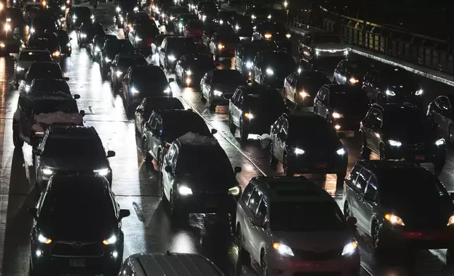 Heavy traffic is seen at the O'Hare International Airport in Chicago, Sunday, Nov. 30, 2025. (AP Photo/Nam Y. Huh)