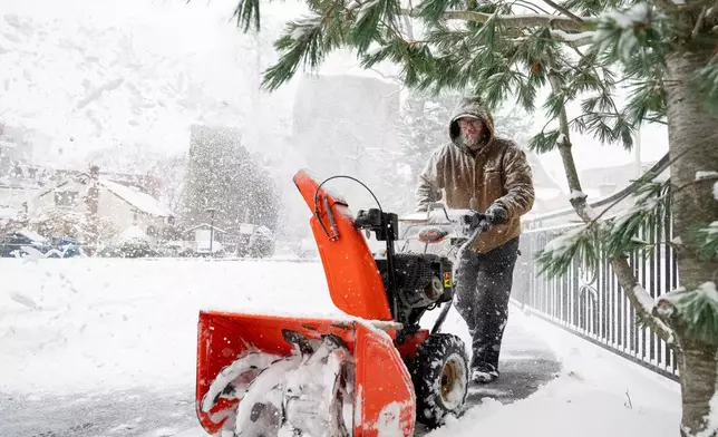 Codi Ackley clears the parking lot outside Hotel Northampton in Northampton, Mass., Tuesday, Dec. 2, 2025. (Daniel Jacobi II/Daily Hampshire Gazette via AP)