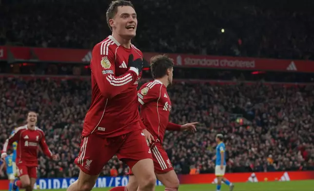 Liverpool's Florian Wirtz celebrates after scoring his side's second goal during the English Premier League soccer match between Liverpool and Wolverhampton Wanderers in Liverpool, Sunday, Dec. 27, 2025. (AP Photo/Ian Hodgson)