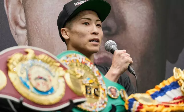 FILE - Japanese champion Naoya Inoue speaks during a press conference after winning over Uzbekistan's Murodjon Akhmadaliev in a boxing match for the unified WBC IBF WBO WBA super bantamweight world title in Nagoya, Japan, Sunday, Sept. 14, 2025.(AP Photo/Shuji Kajiyama, File)