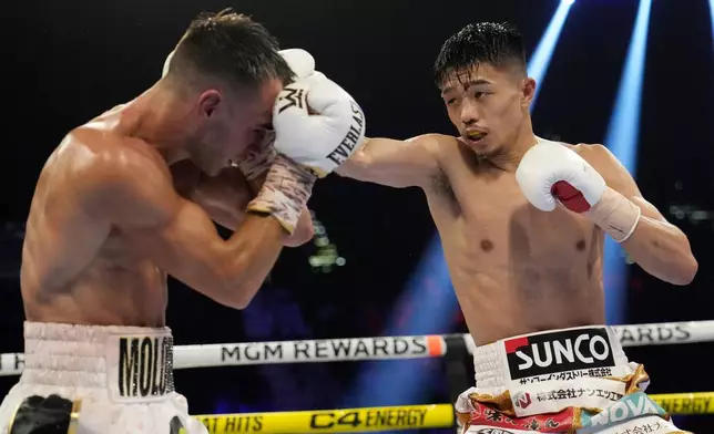 FILE - Junto Nakatani hits Andrew Moloney in a junior bantamweight title boxing match Saturday, May 20, 2023, in Las Vegas. (AP Photo/John Locher, File)