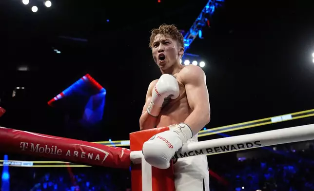 FILE - Naoya Inoue celebrates after defeating Ramon Cardenas in a junior featherweight title boxing match Sunday, May 4, 2025, in Las Vegas. (AP Photo/John Locher, File)
