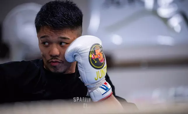 FILE - Junto Nakatani trains at a gym in Sagamihara City, Kanagawa Prefecture, Tuesday, July 1, 2025. (AP Photo/Louise Delmotte, File)