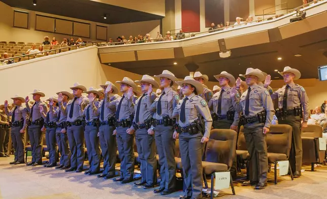 This photo provided by the Texas Parks and Wildlife Department shows new graduates during the 67th Texas Game Warden and State Park Police Officer Commissioning Ceremony on May 30, 2025, in Austin, Texas. (Sonja Sommerfeld/Texas Parks and Wildlife Department via AP)