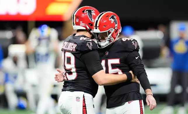Atlanta Falcons place kicker Zane Gonzalez (45) celebrates his go-ahead field goal in the second half of an NFL football game against the Los Angeles Rams, Monday, Dec. 29, 2025, in Atlanta. (AP Photo/Mike Stewart)