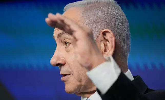 FILE - Israeli Prime Minister Benjamin Netanyahu speaks to the media during a joint press conference with German Chancellor Friedrich Merz in Jerusalem Dec. 7, 2025. (AP Photo/Ariel Schalit, Pool, File)