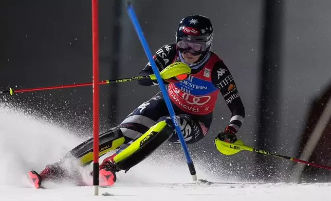 United States' Mikaela Shiffrin competes in an alpine ski, women's World Cup slalom, in Courchevel, France, Tuesday, Dec. 16, 2025. (AP Photo/Giovanni Auletta)