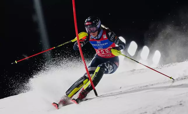 United States' Mikaela Shiffrin competes in an alpine ski, women's World Cup slalom, in Courchevel, France, Tuesday, Dec. 16, 2025. (AP Photo/Pier Marco Tacca)