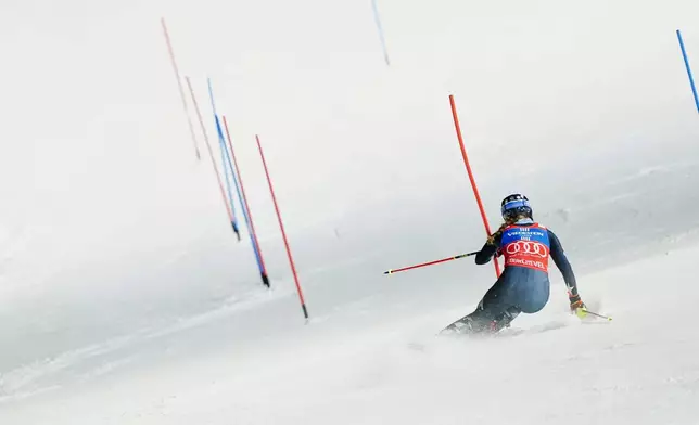 United States' Mikaela Shiffrin competes in an alpine ski, women's World Cup slalom, in Courchevel, France, Tuesday, Dec. 16, 2025. (AP Photo/Pier Marco Tacca)