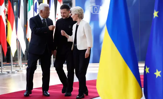 FILE - From left, European Council President Antonio Costa, Ukraine's President Volodymyr Zelenskyy and European Commission President Ursula von der Leyen arrive for an EU Summit at the European Council building in Brussels, March 6, 2025. (AP Photo/Omar Havana, File)