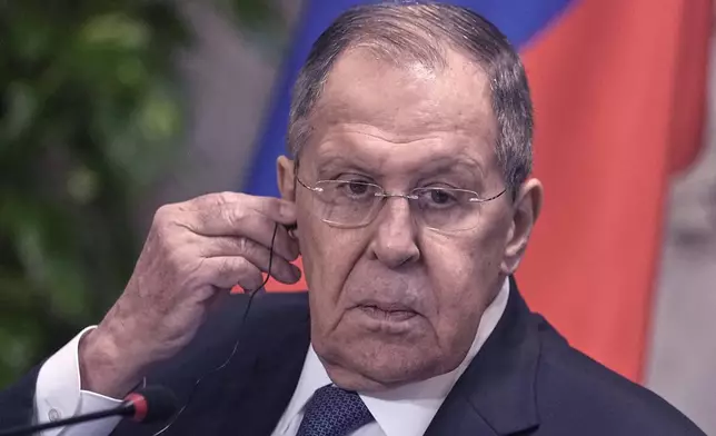 Russian Foreign Minister Sergey Lavrov, speaks during a press conference with his Egyptian counterpart Badr Abdelatty, at Tahrir Palace in Cairo, Egypt, Friday, Dec. 19, 2025. (AP Photo/Amr Nabil)