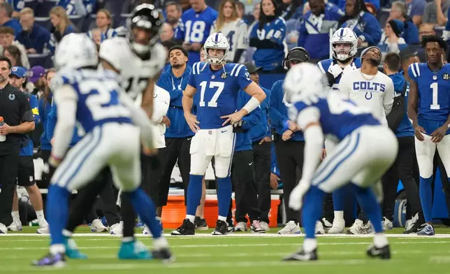Indianapolis Colts quarterback Philip Rivers (17) watches from the sideline during the second half of an NFL football game against the Jacksonville Jaguars Sunday, Dec. 28, 2025, in Indianapolis. (AP Photo/Carolyn Kaster)