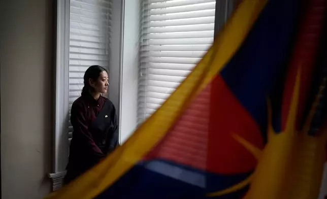Namkyi, a Tibetan former political prisoner who was arrested at 15 and imprisoned for protesting Chinese rule, is photographed at the Office of Tibet, Oct. 7, 2025, in Washington. (AP Photo/David Goldman)