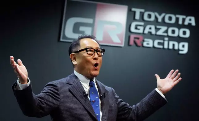 FILE - Then Toyota Motor Corp. Chief Executive Akio Toyoda delivers a speech on the stage at the Tokyo Auto Salon, an industry event similar to the world's auto shows on Jan. 13, 2023, in Chiba near Tokyo. (AP Photo/Eugene Hoshiko, File)