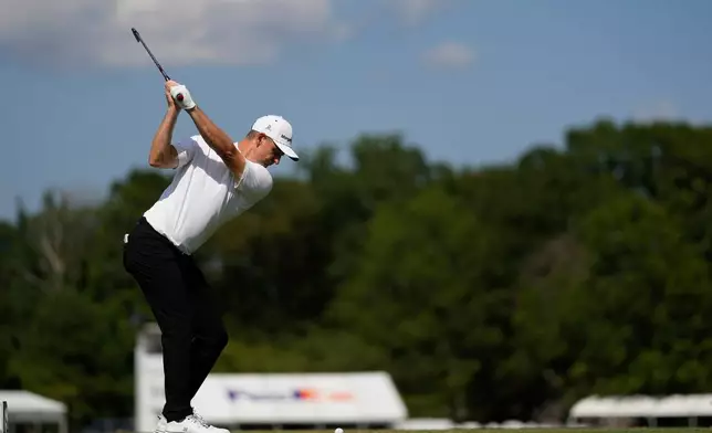FILE PHOTO -Justin Rose, of England, hits on the 14th hole during the final round of the St. Jude Championship golf tournament Sunday, Aug. 10, 2025, in Memphis, Tenn. (AP Photo/George Walker IV, file)