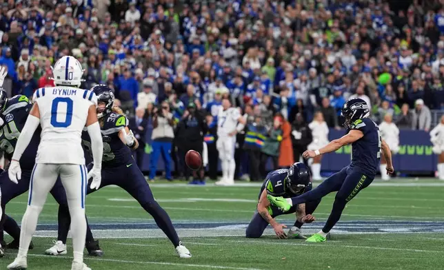 Seattle Seahawks place-kicker Jason Myers (5) kicks the game-winning field goal during the second half of an NFL football game against the Indianapolis Colts, Sunday, Dec. 14, 2025, in Seattle. (AP Photo/Lindsey Wasson)