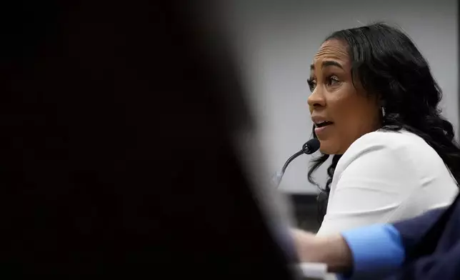 Fulton County District Attorney Fani Willis is seen at the Georgia State Capitol during questioning from a Georgia State Senate panel about her prosecution of President Donald Trump on Wednesday, Dec. 17, 2025, in Atlanta. (AP Photo/Brynn Anderson)