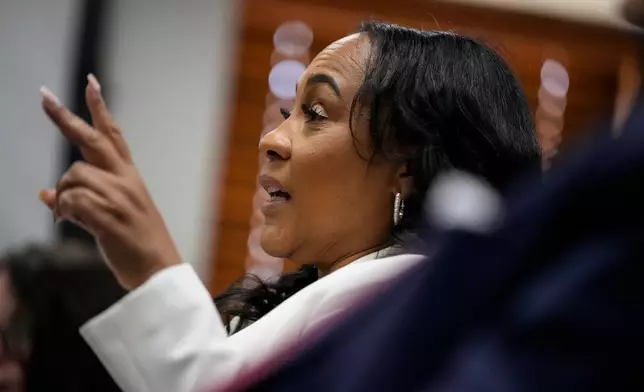 Fulton County District Attorney Fani Willis is seen at the Georgia State Capitol during questioning from a Georgia State Senate panel about her prosecution of President Donald Trump on Wednesday, Dec. 17, 2025, in Atlanta. (AP Photo/Brynn Anderson)