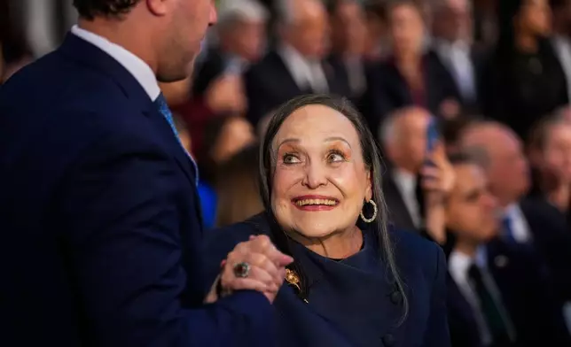 Corina Parisca de Machado, mother of Nobel Peace Prize laureate Maria Corina Machado, reacts during the Nobel Peace Prize award ceremony at Oslo City Hall, in Oslo, Norway, Wednesday Dec. 10, 2025. (Ole Berg-Rusten/NTB Scanpix, Pool via AP)