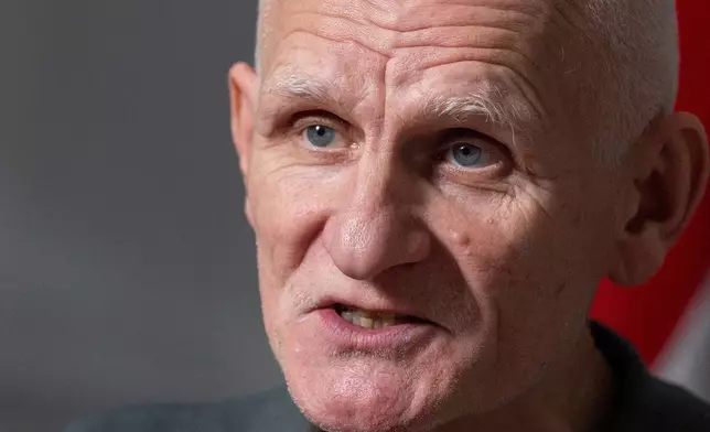 Nobel Peace Prize laureate Ales Bialiatski, one of the Belarusian prisoners released on Saturday, speaks during an interview with the Associated Press in Vilnius, Lithuania, on Sunday, Dec. 14, 2025. (AP Photo/Mindaugas Kulbis)